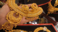 Gold price hits record high of Tk1.35 lakh per bhori