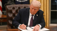 Trump signs order to pull US from WHO